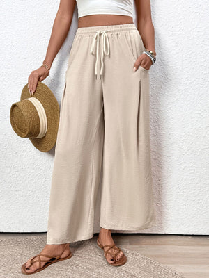 Tan Luxe Drape Palazzo Trousers with drawstring waist and pockets.