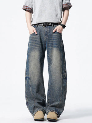 Men's dark wash wide-leg denim jeans with vintage fade and relaxed fit.