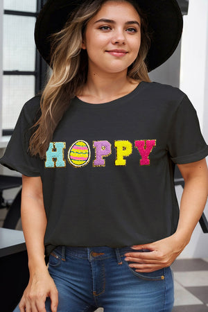 Black t-shirt with sequin "Hoppy" Easter graphic and egg detail