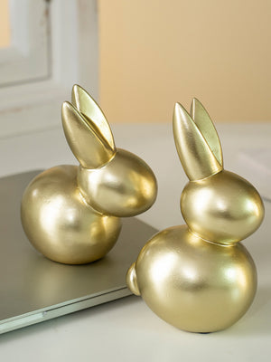 Elegant gold resin rabbit figurines, Style A and Style B, abstract decor.