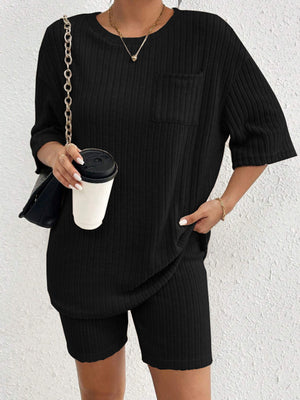 Black ribbed loungewear set with short sleeves, crew neck, and chest pocket.
