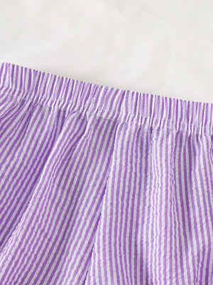 Children's purple and white striped seersucker shorts with elastic waistband.