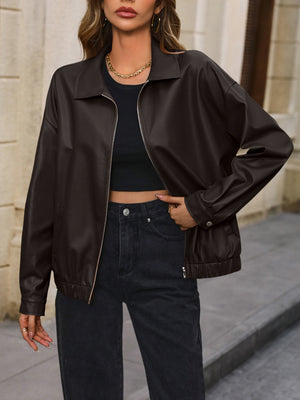 Brown faux leather bomber jacket with zip front and elastic cuffs.