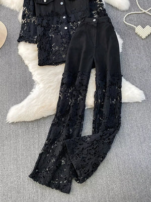 Black lace-embellished two-piece set with collared button-up top and wide-leg pants.