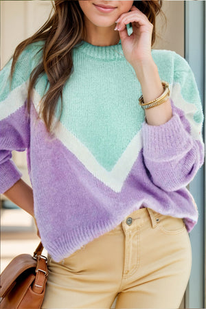 Chevron colorblock knit pullover sweater in lavender and mint green acrylic with white accents.