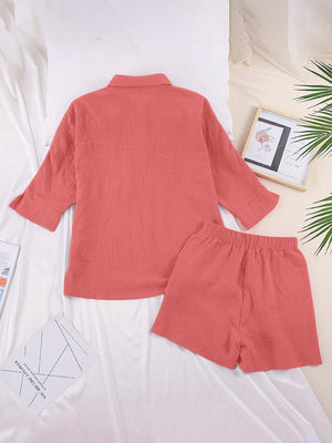 Coral gauze cotton resort shirt & shorts set with buttoned collar and elastic waist shorts.