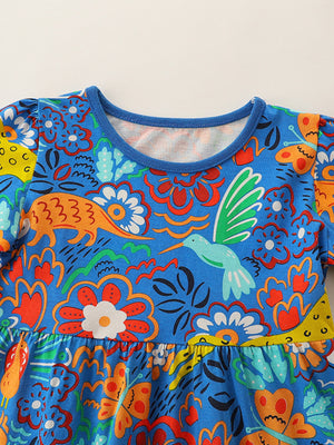 Blue cotton toddler dress with whimsical animal and floral print, ruffled sleeves, and round neckline.