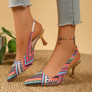 Geometric patterned slingback kitten heels in multicolor with pointed toe and gold heel.