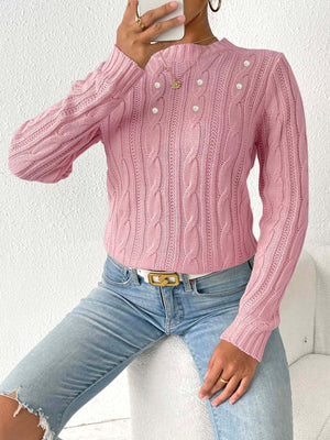 Dusty Pink cable knit sweater with pearl embellishments and mock neckline.