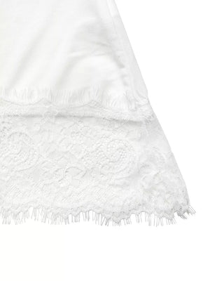 White tee with lace trim detail and scalloped hem.