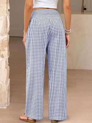 Blue plaid maternity pants with smocked waistband and wide legs.