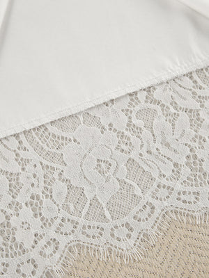 White lace trim detail on a soft fabric lounge set.