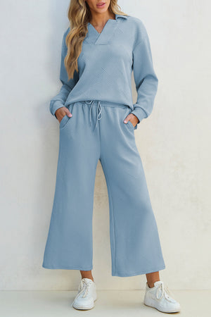 Light blue textured polo sweatshirt and wide-leg culottes outfit set with drawstring waist