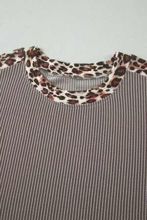 Ribbed knit two-piece set with leopard trim neckline and cuffs.
