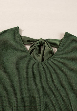 Dark green ribbed knit sweater with a satin bow detail at the back neckline.