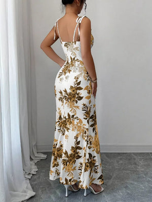 Maxi dress with floral print, tie straps, and a flattering fit.
