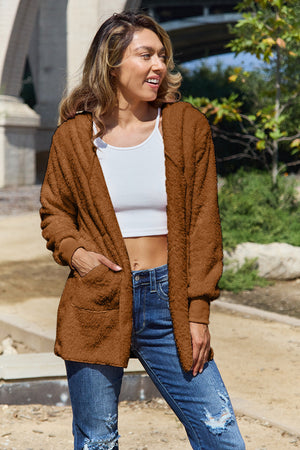 Plush hooded cardigan jacket in brown with pockets and ribbed cuffs.
