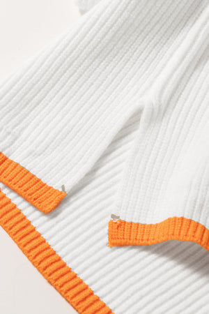 White ribbed quarter-zip pullover with orange trim detail