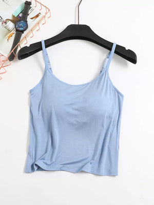 Light blue adjustable cami with thin straps and a scoop neckline.
