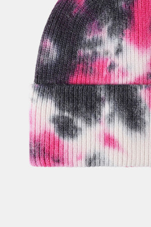 Ribbed knit beanie with black, pink, and white tie-dye pattern