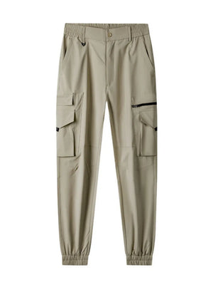 Khaki cargo pants with multiple pockets and elastic cuffs.