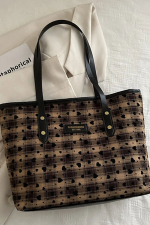 Camel plaid tote bag with black leather trim and all-over heart pattern