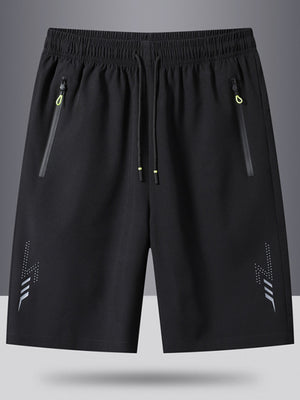 Men's black athletic shorts with drawstring, zip pockets, and reflective lightning detail.