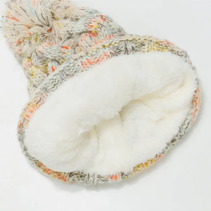 Textured knit beanie with multicolor flecks and sherpa lining.