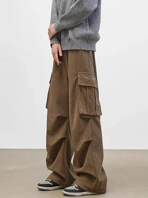 Brown cargo pants with multiple utility pockets and a relaxed fit.
