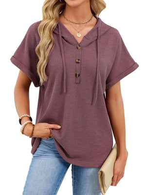 Waffle knit short sleeve hooded top in brick red with button placket and drawstring.