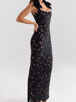 Black floral lace maxi dress with tie shoulder detail and cutout bodice.