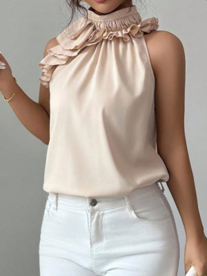 Apricot ruffled high neck sleeveless blouse with cascading ruffles on the shoulders.