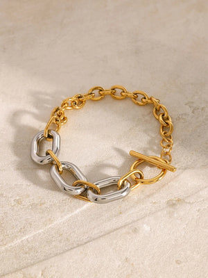 Two-tone gold and silver chain link bracelet with toggle clasp