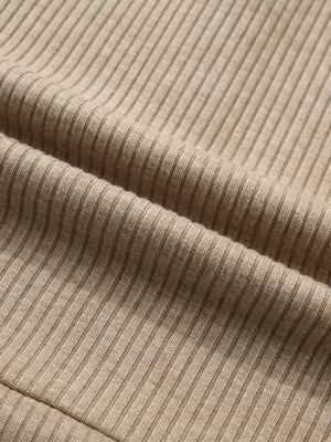 Cozy ribbed knit maternity shirt in beige with subtle denim accents.