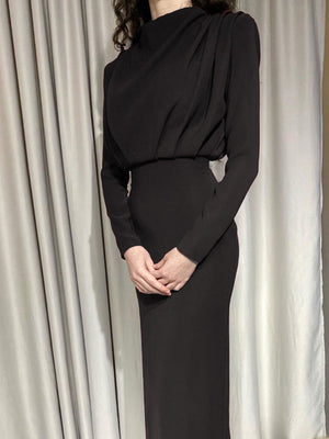 Black mock neck maxi dress with ruched bodice and defined waist