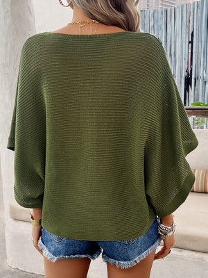 Open-knit dolman sleeve sweater in matcha green with a V-neckline.