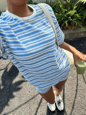 Light Blue Stripes relaxed fit two-piece set with crew neck and short sleeves.
