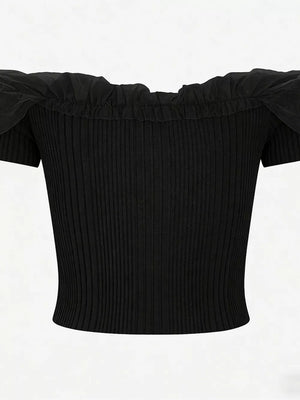 Black off-shoulder ruffled knit maternity t-shirt with short sleeves.