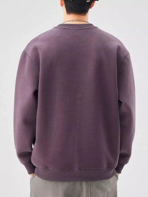 Men's oversized purple crewneck sweatshirt with ribbed cuffs and hem
