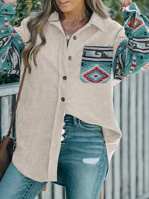 Corduroy shacket in dust storm with Aztec print sleeves and pocket detail.