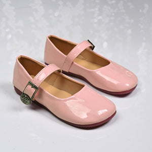 Pink patent buckle strap Mary Jane loafers with a rose detail buckle.