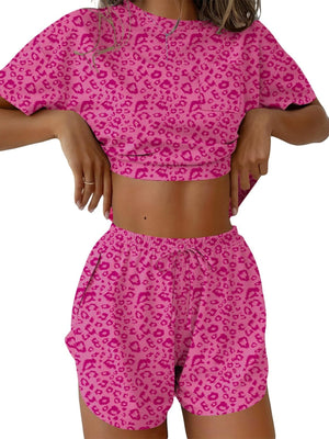 Pink leopard print pajama set with drawstring shorts and cropped t-shirt