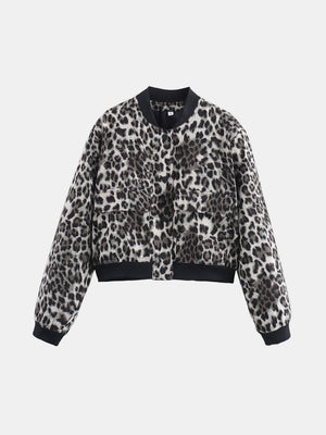 Boxy bomber jacket in leopard print with black trim and two front pockets.