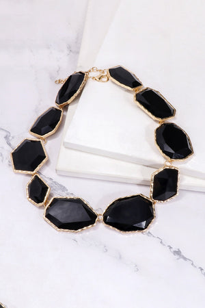Black resin stone collar necklace with gold-tone alloy setting.