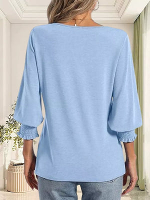 Sky blue maternity t-shirt with ruched 3/4 sleeves and smocked cuffs.