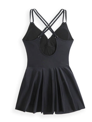 Black wrap swim dress with crisscross straps and a flared skirt.