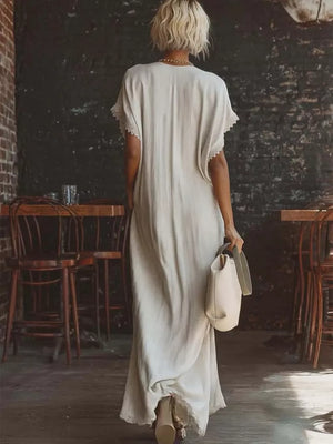 White lace-trimmed V-neck maxi dress with pockets, cotton blend, short sleeves.