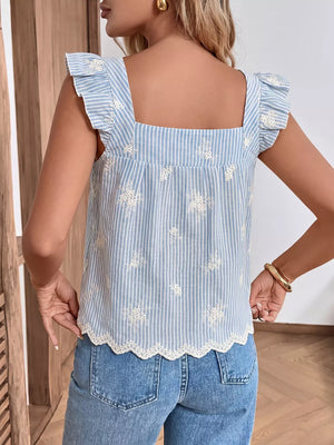Embroidered striped peplum blouse with ruffled sleeves and eyelet hem.