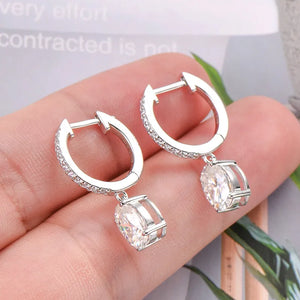 Silver pavé hoop and oval moissanite drop earrings with clear stones