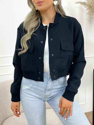 Black bomber jacket with utility pockets and button front, ribbed cuffs and hem.